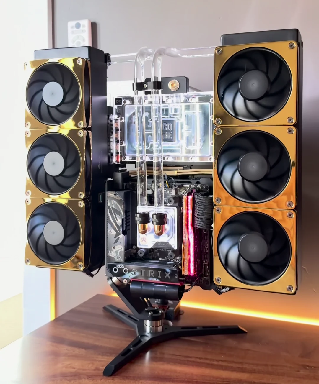 Full view of the black and gold 5090 custom PC, including both fan arrays and the complete open-frame stand